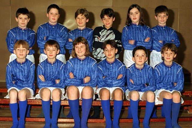 English Martyrs RC Primary U-11 football team. Pictured, back row from left, James Graham, Christopher Holmes, Mark Turver, Andrew Long, Ruth Williams and Adam Unwin. Front row, from left, James Thompson, Marc Houghton, Helen Fraser, Philip D'Arcy, Tom Mannion and Mark Rozanski.