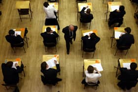 File photo dated 07/03/12 of pupils sitting an exam.