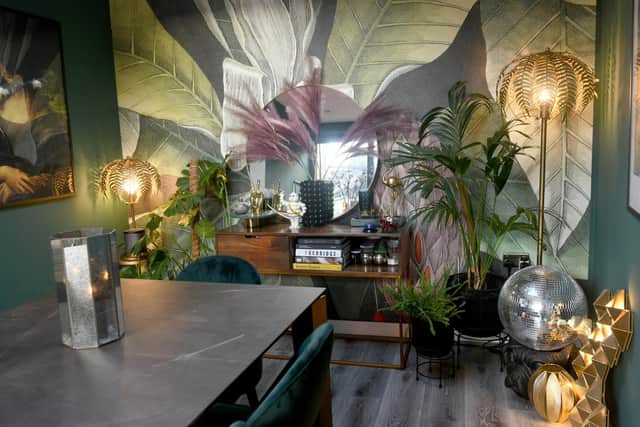 The dining room with mural is one of Amanda's favourite spaces