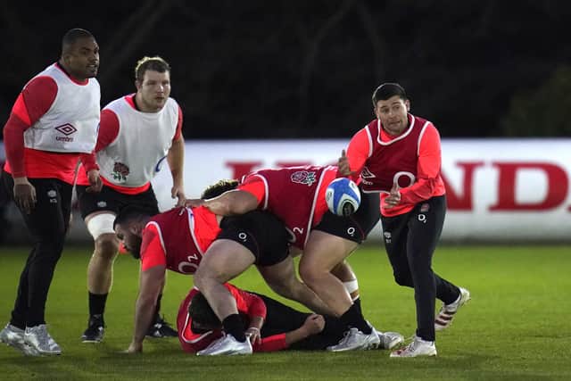 England's Ben Youngs (right) offloads the ball during a training session at Pennyhill Park earlier this week. Picture: Andrew Matthews/PA