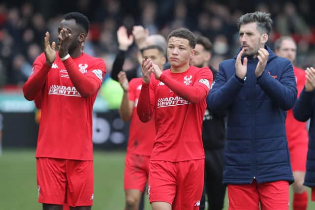 Kidderminster Harriers' players applaud suppporters on the pitch after the English FA Cup fourth round football match between Kidderminster Harriers and West Ham United at Aggborough Stadium (Picture: GEtty Images)