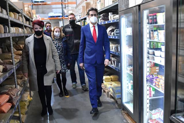 Ed Miliband visits Lembas, an employee owned, vegetarian and vegan whole foods wholesaler with (from left) Louise Haigh MP, Olivia Blake MP and Jez Maryon, director of Lembas on February 11, 2022 in Sheffield.