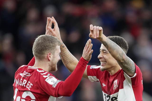 Middlesbrough's Duncan Watmore (left) celebrates with Marcus Tavernier after scoring their fourth goal of the game against Derby (Picture: PA)