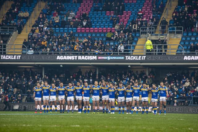 Rhinos line up against racism before the Warrington game. Picture by Tony Johnson.