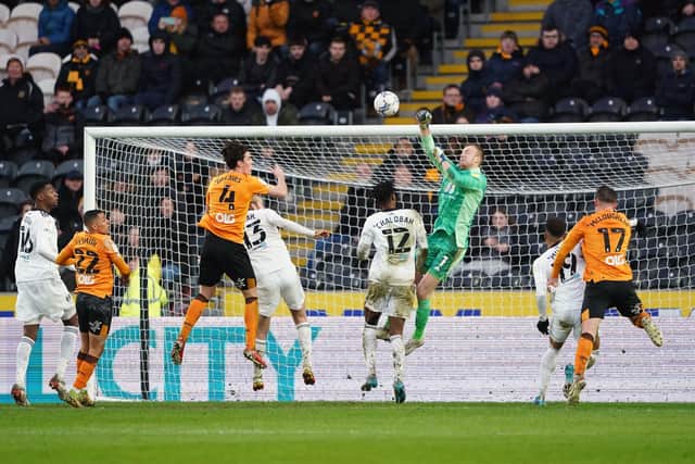 Fulham goalkeeper Marek Rodak (centre) makes a save during the Sky Bet Championship match at the MKM Stadium (Picture: PA)
