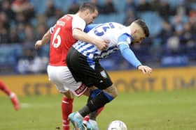 BATTLE: Callum Paterson shields the ball from Rotherham United captain Richard Wood