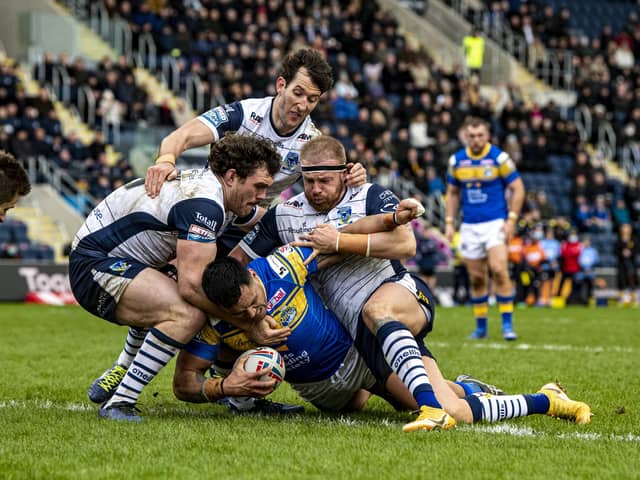 Leeds Rhinos' Zane Tetevano goes over to score Leeds first try. (Picture: Tony Johnson)