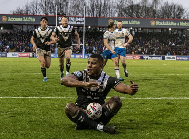 Sitting pretty: Hull FC's Joe Lovodua celebrates his try early in the second half against Wakefield. Picture: Tony Johnson