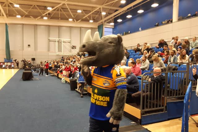 Leeds Rhinos' mascot prepares for the start as the crowd fills up.