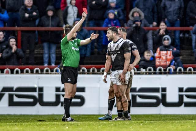 Hull FC’s Jake Connor recieves a red card from referee Marcus Griffiths after making contact with the head against Wakefield Trinity. Picture: Tony Johnson.
