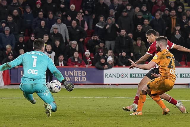 NO WAY THROUGH: Sheffield United's lliman Ndiaye sees his shot saved by Matt Ingram at Bramall Lane on Tuesday night. Picture: Andrew Yates/Sportimage