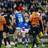 Referee Chris Kendall shows the red card to Leeds Rhinos James Bentley - right.  Picture: Tony Johnson