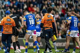 Referee Chris Kendall shows the red card to Leeds Rhinos James Bentley - right.  Picture: Tony Johnson