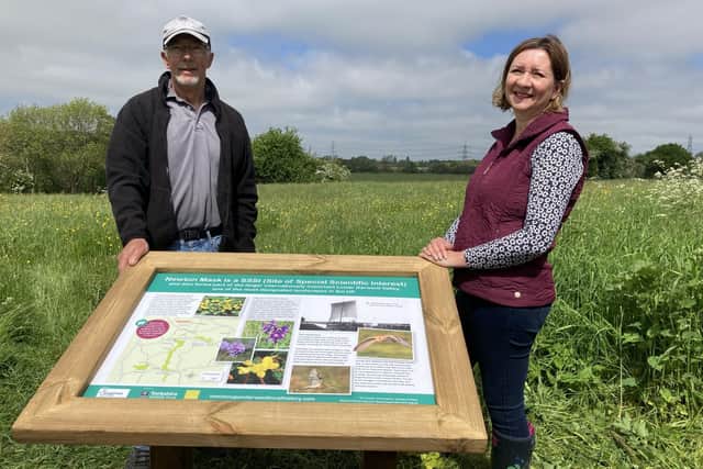 The new information board on the ings depicts the flora and fauna at the site in Newton Upon Derwent.