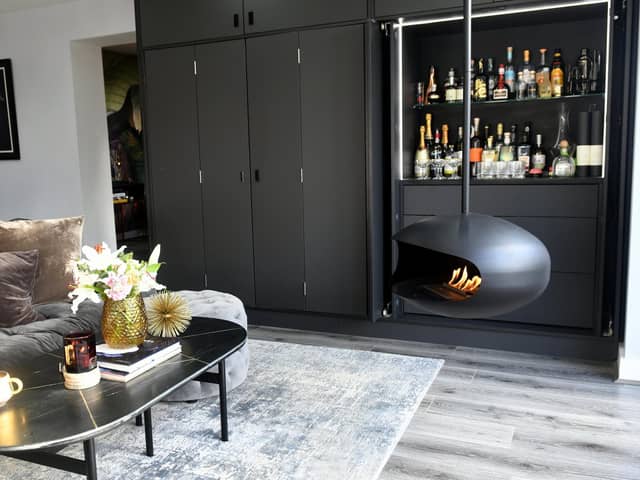 A must-have in the open plan kitchen/living space was a bar, which is neatly hidden away in a bespoke fitted cabinet, as is the TV but the undoubted star of the show is the Aeris bioethanol fire from Cocoon, which doesn’t require a flue or a connection to gas or electricity. Suspended from the ceiling, it runs on bio ethanol, a plant-based fuel, and when lit it throws out warmth with no ash, soot or smoke.