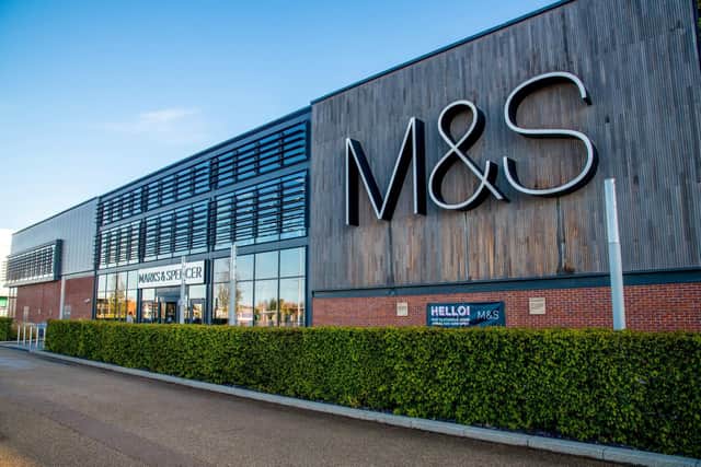 Marks & Spencer is to raise its minimum pay for staff to £10 an hour and boost health benefits for workers.