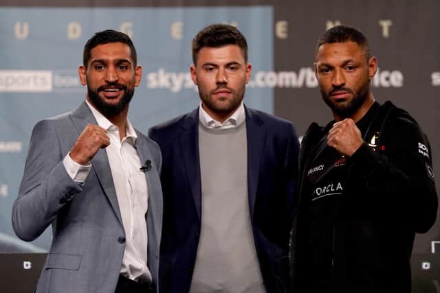 Amir Khan (left), promoter Ben Shalom and Kell Brook during a press conference at the Exchange Hall, Manchester. Picture: PA