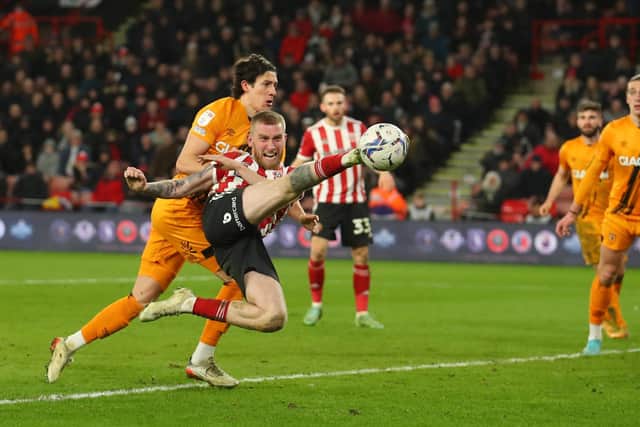Sheffield United's Oli McBurnie gets a shot in against Hull City. Picture: Simon Bellis / Sportimage