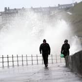 Big waves hit the sea wall at Whitby Yorkshire, before Storm Dudley hit the north of England earlier this week