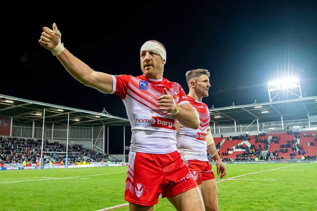 St Helens hooker James Roby salutes the crowd after last weekend's opening-game victory over Catalans Dragons. Picture: Allan McKenzie/SWpix.com.