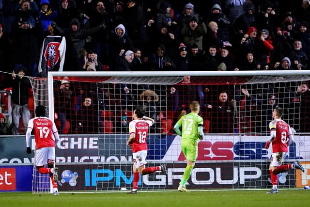 Ollie Rathbone celebrates his equaliser for Rotherham United against Wigan Athletic. Picture: PA.