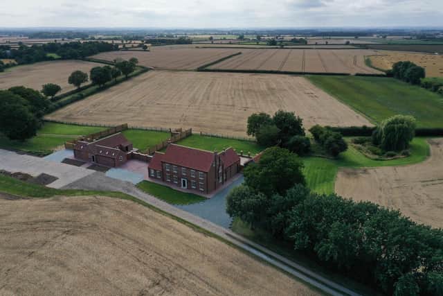 A drone shot of Pasture House and the two stable cottages