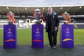 'Mr Hull': Black and Whites legend Johnny Whiteley with the rugby league World Cups at the MKM Stadium last December. Picture by Allan McKenzie/SWpix.com