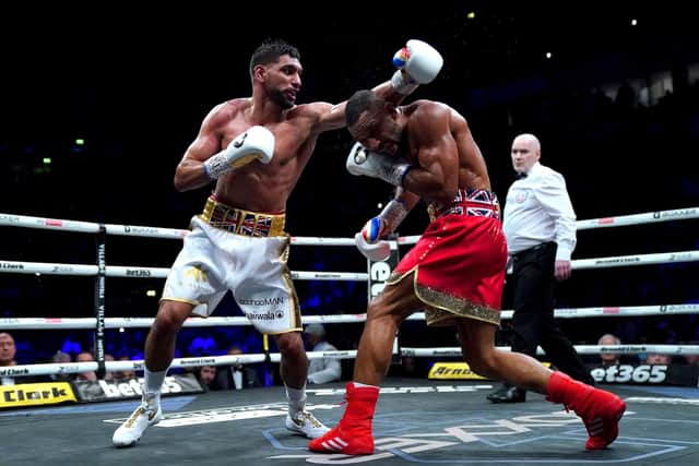 Amir Khan (left) and Kell Brook battle during their Welterweight Contest fight at the AO Arena. Picture: Nick Potts/PA