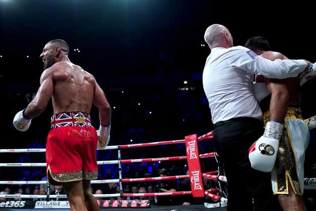 Kell Brook (left) celebrates after the referee steps in to end the fight during round six against Amir Khan at the AO Arena, Manchester. Picture: Nick Potts/PA