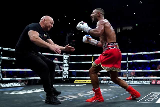 Kell Brook (right) celebrates with his trainer Dominic Ingle after winning the Welterweight Contest fight against Amir Khan at the AO Arena, Manchester. Picture: Nick Potts/PA