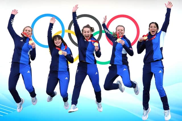 Great Britain's Mili Smith, Hailey Duff, Jennifer Dodds, Vicky Wright and Eve Muirhead celebrate with the gold medal after victory in the Women's Gold Medal Game in Beijing. Picture: Andrew Milligan/PA