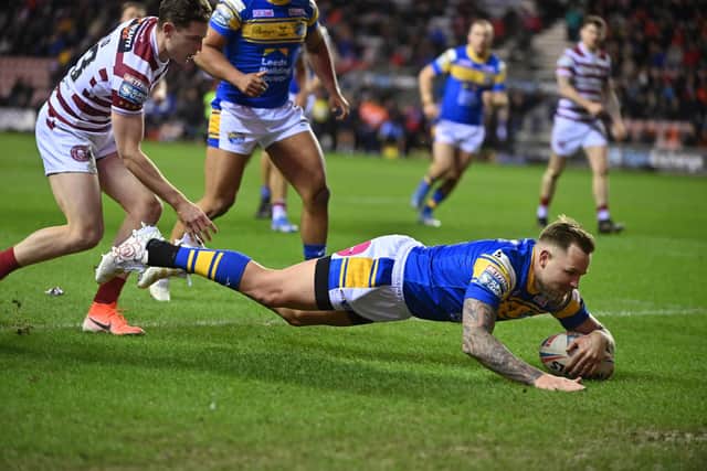 Blake Austin scores Leeds Rhinos first try against Wigan Warriors on Friday night but it was to end in disappointment at the DW Stadium. Picture: Bruce Rollinson