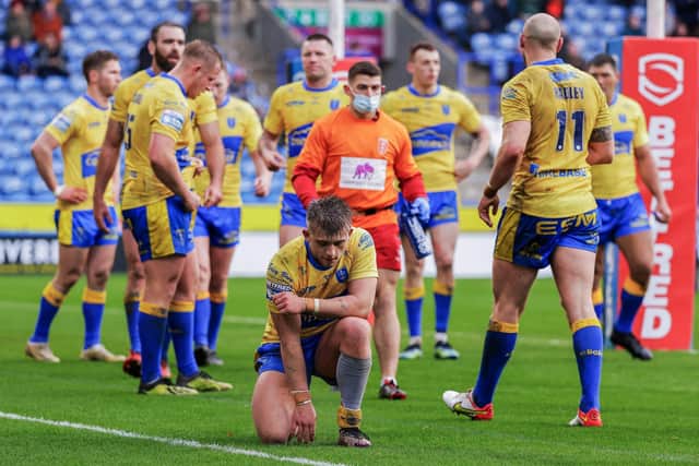 TOUGH DAY: Hull KR's Mikey Lewis looks dejected after his side concedes a try. Picture by Alex Whitehead/SWpix.com
