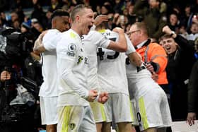 STAR PERFORMER: Leeds United's Adam Forshaw (foreground) celebrates Raphinha's equaliser