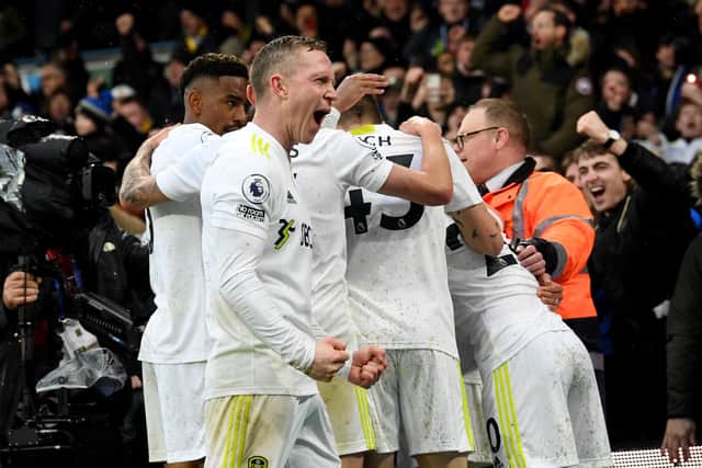 Adam Forshaw celebrates the Raphinha  goal for Leeds United. Picture: Simon Hulme