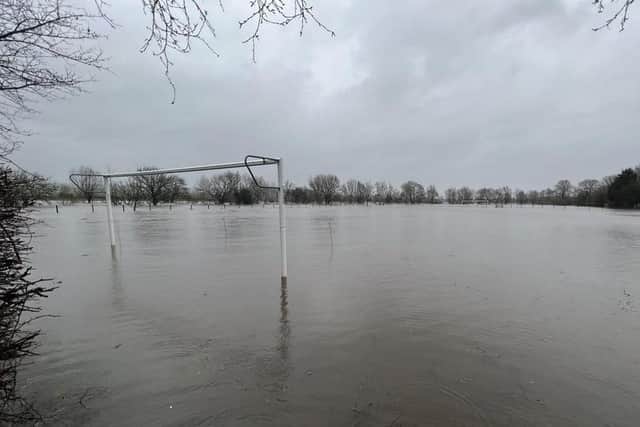 A playing field completely underwater on Sunday after the River Wharfe burst its banks in Pool