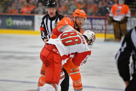 Robert Dowd gets to grips with Cardiff's Jake Coughler during Sunday night's 3-2 loss at the Utilita Arena. Picture: Dean Woolley/EIHL.