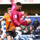 Hull City goalkeeper Matt Ingram (top middle) clashes with QPR's Albert Adomah leading to him being taken off injured at Loftus Road. Picture: Jacques Feeney/PA Wire
