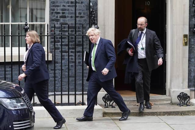 Prime Minister Boris Johnson leaving 10 Downing Street, London, to update MPs in the House of Commons on the latest situation regarding Ukraine.