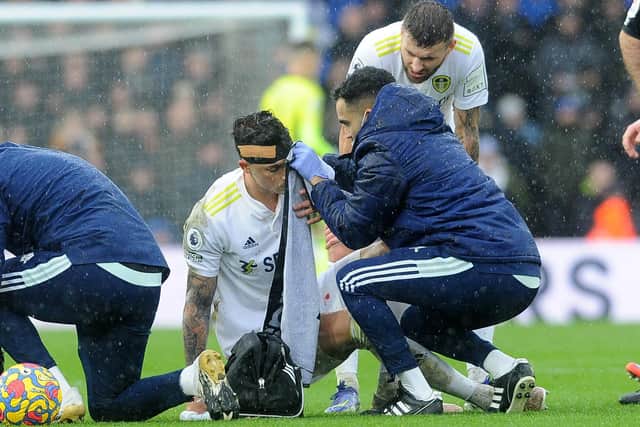 Leeds United's Robin Koch has his head injury tended to during Sunday's defeat to Manchester United before going off a short while later after complaining of feeling dizzy Picture: Simon Hulme.