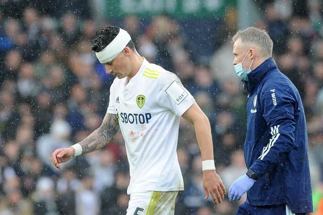 Leeds United defender Robin Koch leaves the Elland Road pitch with a head injury during Sunday's Premier League defeat to Manchester United Picture: Simon Hulme.