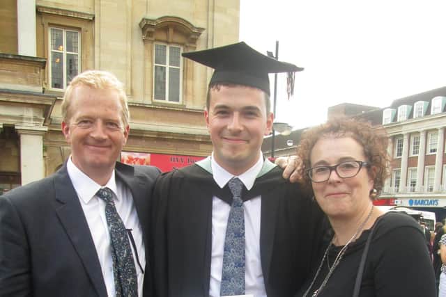 Jack Ritchie (centre) at his graduation with his parents Charles and Liz Ritchie
