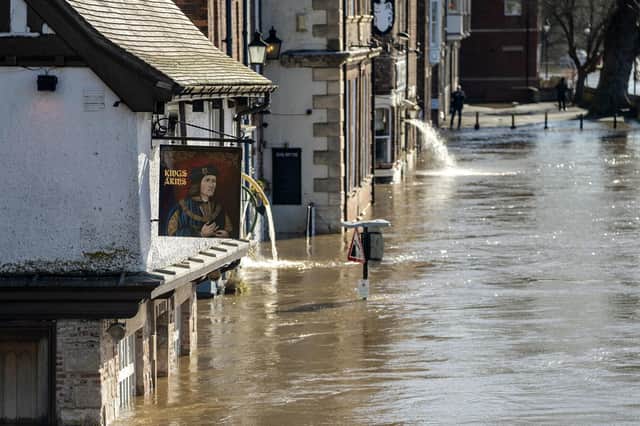 Flood water in York, Yorkshire, after the River Ouse overtopped its banks. The Environment Agency has urged communities in parts of the West Midlands and the north of England, especially those along River Severn, to be prepared for significant flooding until Wednesday following high rainfall from Storm Franklin. Picture date: Tuesday February 22, 2022. PA Photo.  See PA story WEATHER Storms. Photo credit should read: Danny Lawson/PA Wire