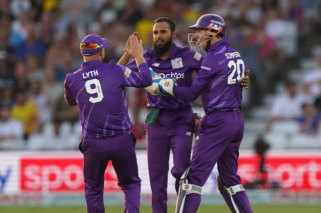 BACK FOR MORE: Adil Rashid (centre) is back in The Hundred with Northern Superchargers for the 2022 competition. Picture: Tim Goode/PA
