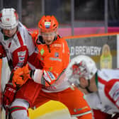 Jonathan Phillips battles on the boards during Sheffield Steelers' Sunday night Elite League clash with Cardiff Devils. Picture: Dean Woolley/EIHL.