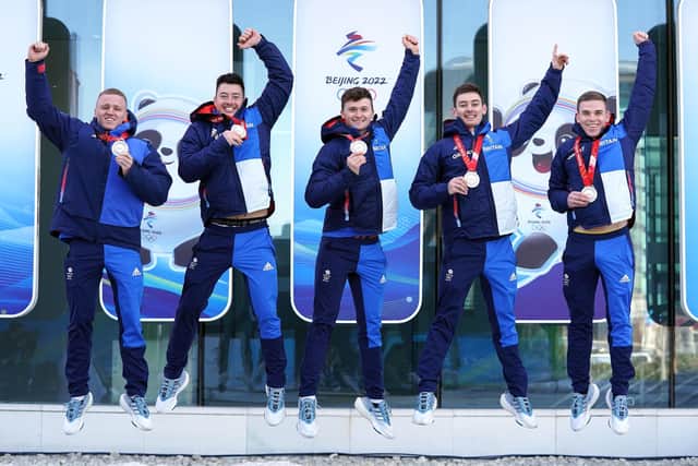 Great Britain's Bobby Lammie, Hammy McMillan, Bruce Mouat, Grant Hardie and Ross Whyte celebrate with their silver medals. Picture: Andrew Milligan/PA