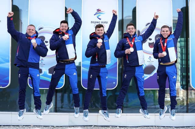 Great Britain's Bobby Lammie, Hammy McMillan, Bruce Mouat, Grant Hardie and Ross Whyte celebrate with their silver medals. Picture: Andrew Milligan/PA