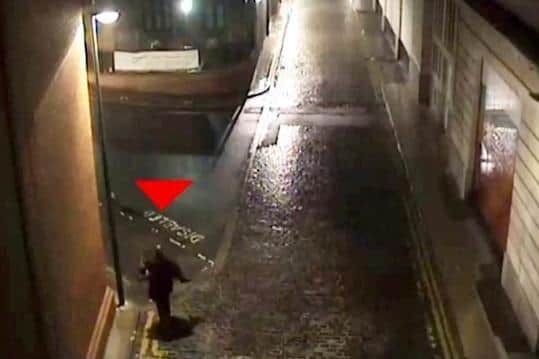 The footage shows Austin Osayande, 40, carrying a 24-year-old woman through the deserted streets of Leeds on August 14, 2015