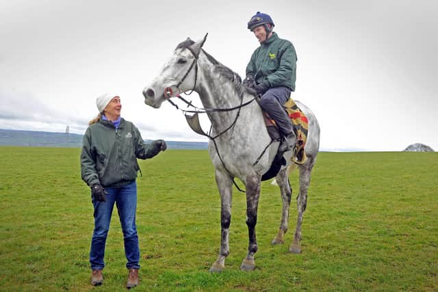 2013 Grand National-winning trainer Sue Smith with Vintage Clouds and the now retired jockey Danny Cook.