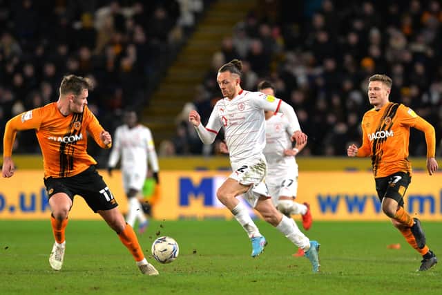 Barnsley's Jordan Williams runs at the Hull City defence on Tuesday night. Picture: Bruce Rollinson